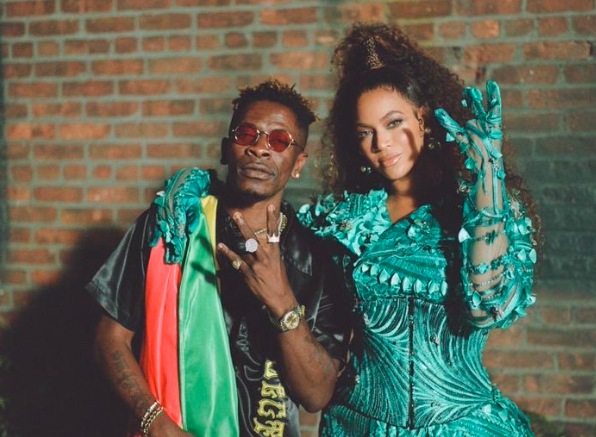 Shatta Wale doing the sign of hope with Beyonce on the Already song.