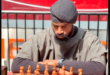 Under the beaming lights of New York's iconic Times Square, Nigerian chess master Tunde Onakoya has broken the record for the longest chess marathon. Onakoya played for a total of 58 hours straight, surpassing the previous record by two hours.