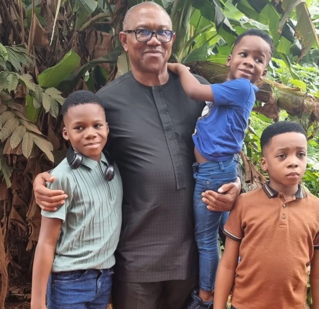 Peter Obi with Junior Pope's children at his funeral
