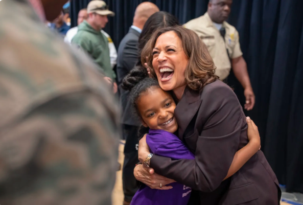 Vice President Kamala Harris with young supporter