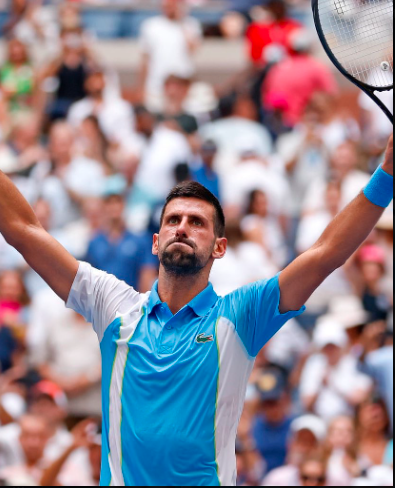 Novak Djokovic in a joyed mood after winning his 90th game. 