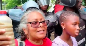 During the #ReOccupyJulorbiHouse demonstration, the Ghana Police Service apprehended at least ten protesters, including a 62-year-old woman and her 10-year-old daughter.